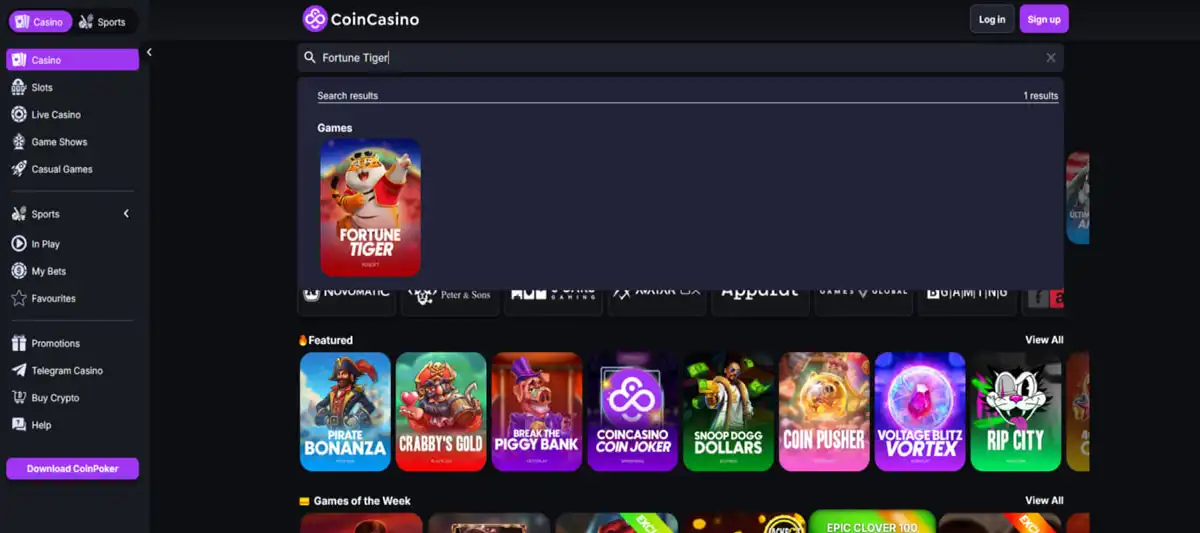 Coin Casino homepage with search bar highlighting the Fortune Tiger slot by PG Soft